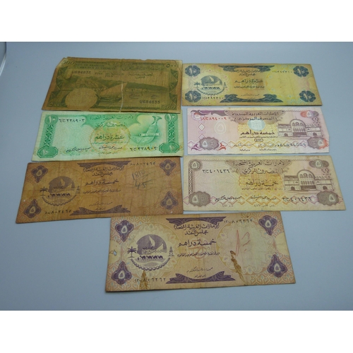 845 - A collection of fifty vintage bank notes, US dollars, South Arabian, Australia, etc.