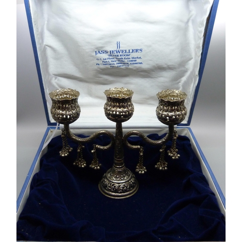 846 - An Eastern triple candelabra, height 16.5cm