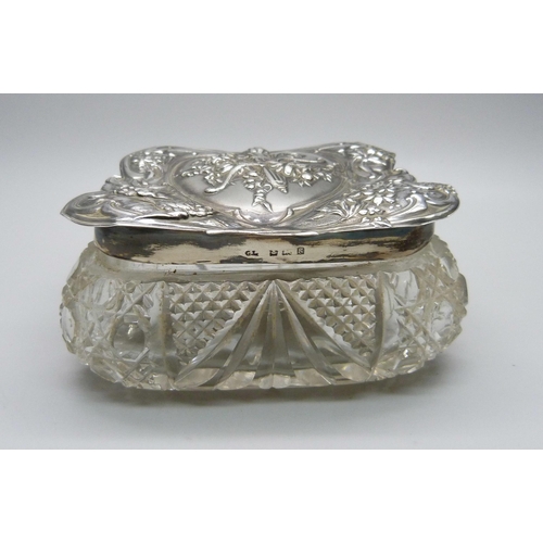 851 - A silver topped glass jar, Birmingham 1906, top 37g