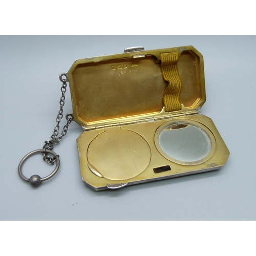 854 - A silver compact with gilt interior, Birmingham 1919, Henry Matthews, 77.5g, 4cm x 8cm