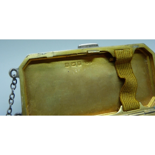 854 - A silver compact with gilt interior, Birmingham 1919, Henry Matthews, 77.5g, 4cm x 8cm