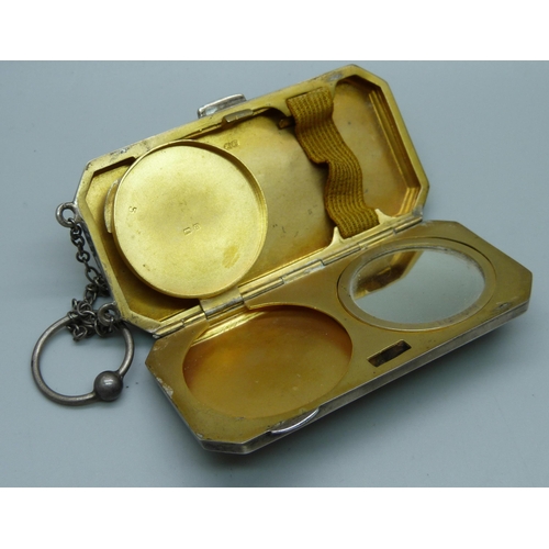 854 - A silver compact with gilt interior, Birmingham 1919, Henry Matthews, 77.5g, 4cm x 8cm