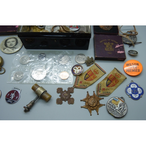 861 - An assortment of badges, commemorative medals, sovereign holder, etc.