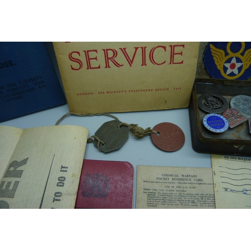 862 - A WWI wound badge, 207917, lacking pin, an 'If the Invader comes' leaflet, a RAF Service and Pay Boo... 