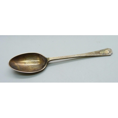 866 - A cased set of six silver coffee spoons with engine turned detail, 50g