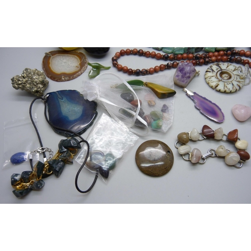 868 - A collection of unmounted gemstones, beads for threading, agate slices, etc.