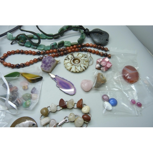 868 - A collection of unmounted gemstones, beads for threading, agate slices, etc.