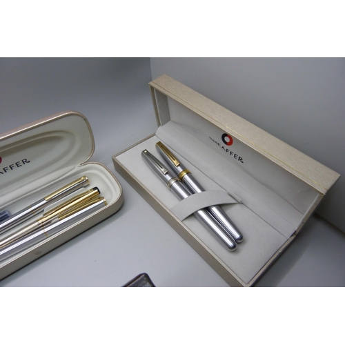 878 - A collection of five boxed Sheaffer fountain pens, ballpoints and pencils