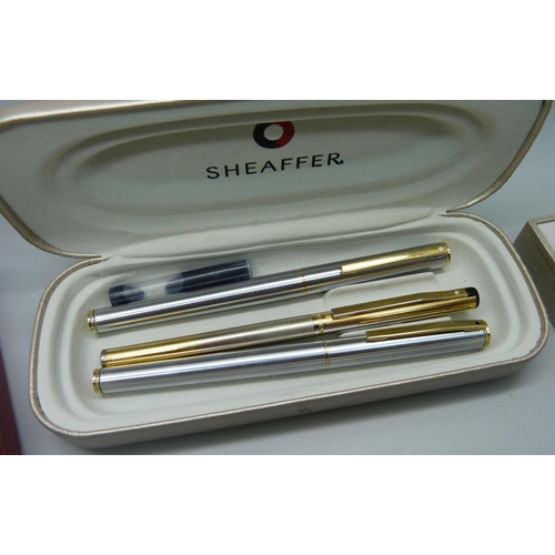 878 - A collection of five boxed Sheaffer fountain pens, ballpoints and pencils