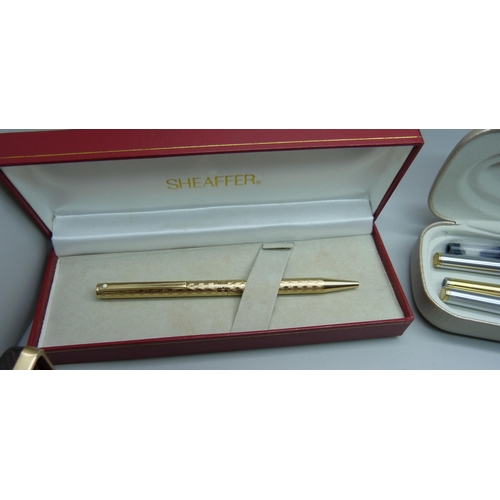 878 - A collection of five boxed Sheaffer fountain pens, ballpoints and pencils