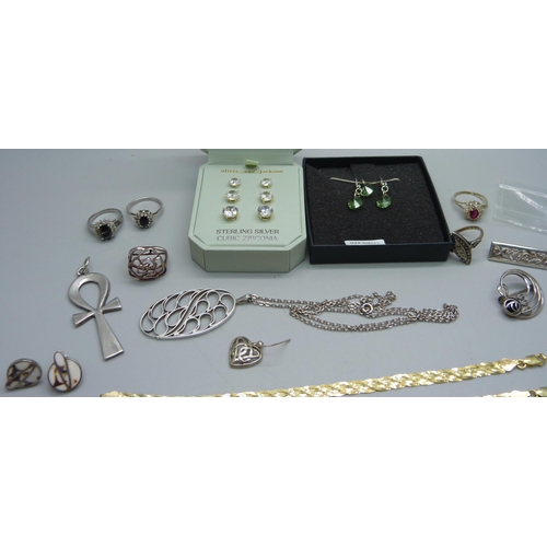 884 - Silver jewellery including Egyptian Ankh pendant, stone set rings, two silver gilt bracelets, etc.