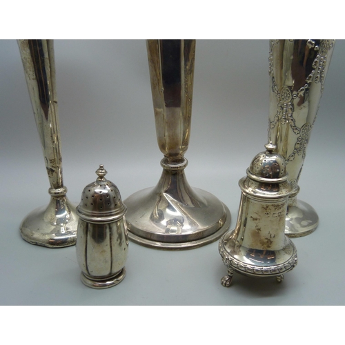 901 - Two silver vases, weighted, a/f, a white metal vase and two silver peppers, peppers 75g