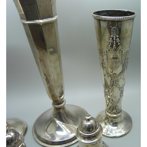 901 - Two silver vases, weighted, a/f, a white metal vase and two silver peppers, peppers 75g