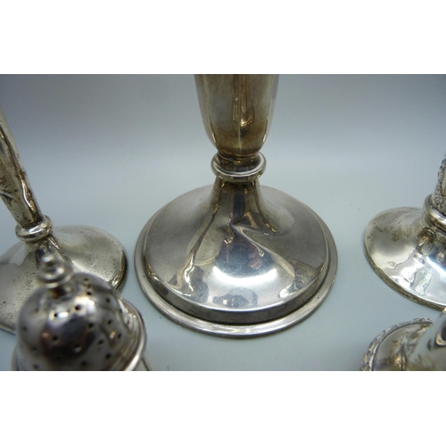 901 - Two silver vases, weighted, a/f, a white metal vase and two silver peppers, peppers 75g