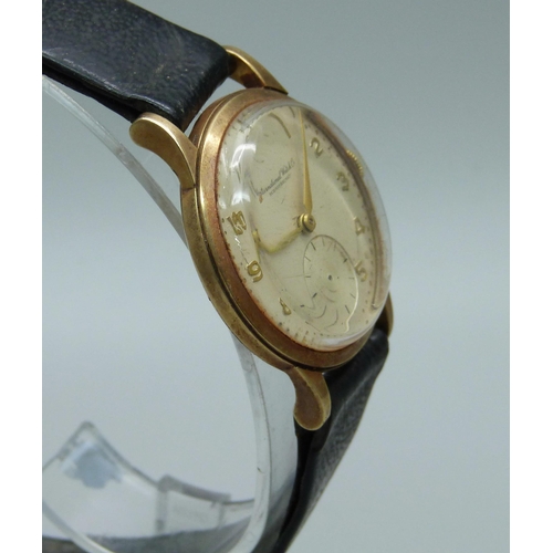 938 - A 9ct gold International Watch Company Schaffhausen wristwatch, case back bears inscription dated 19... 