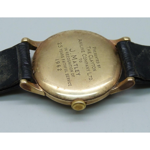 938 - A 9ct gold International Watch Company Schaffhausen wristwatch, case back bears inscription dated 19... 