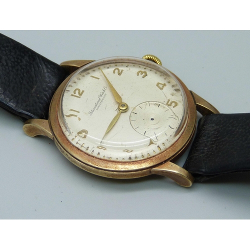 938 - A 9ct gold International Watch Company Schaffhausen wristwatch, case back bears inscription dated 19... 