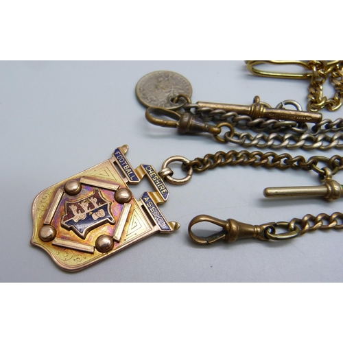 946 - A Victorian 9ct gold and enamelled football fob medal, Cheshire Football Association, 1891, with ins... 