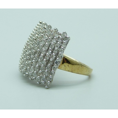 950 - A 9ct gold and diamond ring, 4.1g, L