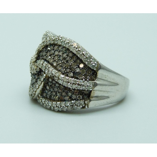 954 - A silver and diamond ring, O