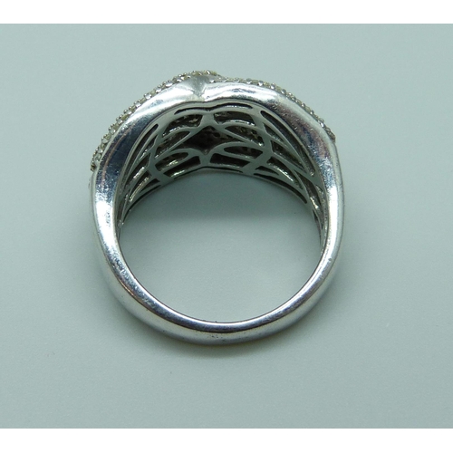 954 - A silver and diamond ring, O