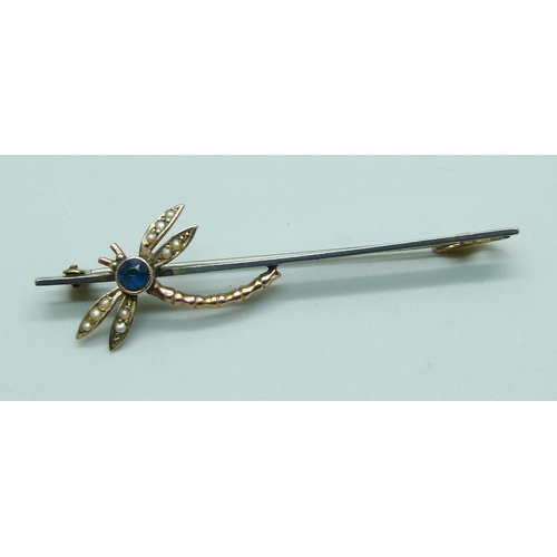 956 - A 9ct gold, seed pearl and blue stone dragonfly brooch, 2.9g, (metal pin)