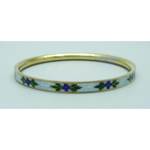 958 - An enamelled gilt metal bangle