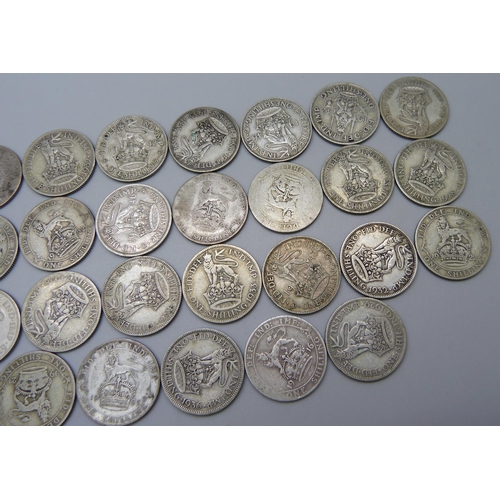 985 - Thirty-three 1920-1947 one shillings, 181.9g