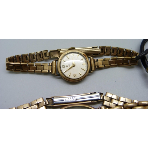 988 - Three lady's 9ct gold cased wristwatches, including Omega