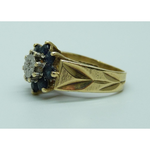 993 - A 1970's 9ct gold, sapphire and diamond cluster ring, 4g, J