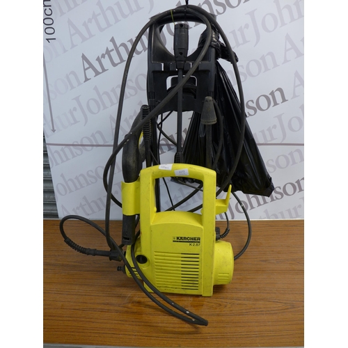 2272 - A Karcher K2.87 jet wash with 3 attachments and floor scrubber