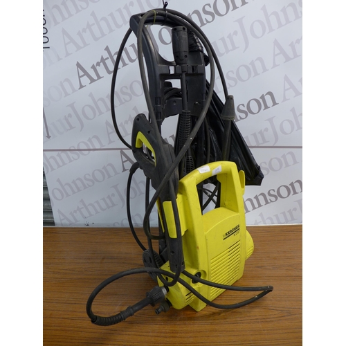 2272 - A Karcher K2.87 jet wash with 3 attachments and floor scrubber