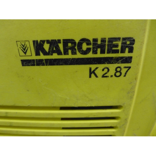 2272 - A Karcher K2.87 jet wash with 3 attachments and floor scrubber