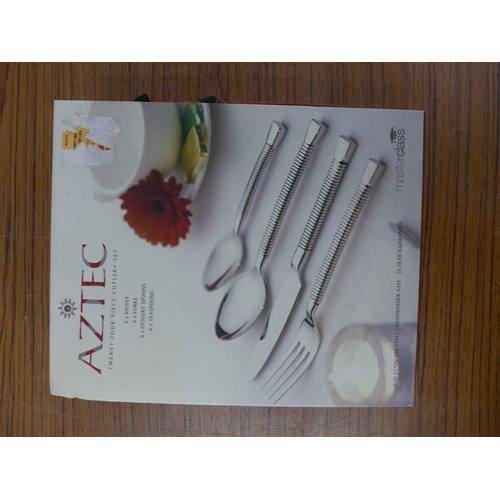 2329 - An Aztec 24 piece cutlery set, a Royal Worcester cake plate and 4 Royal Doulton glasses