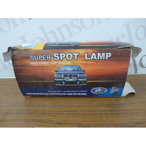 2335 - Assorted unused car parts including: a super spot lamp system, a door/ rear deck speaker and Paddy H... 