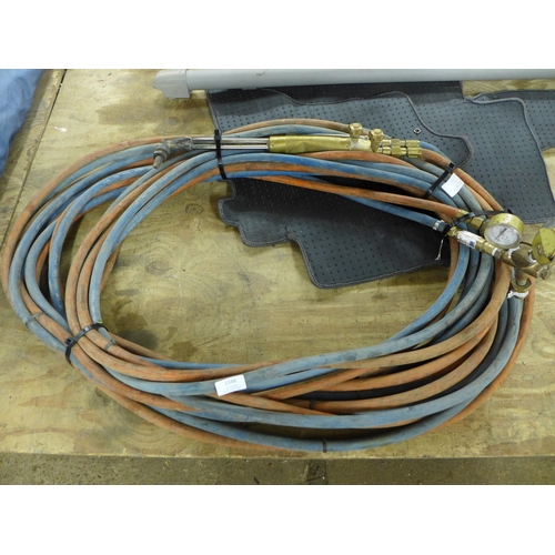 2348 - A pair of Oxyacetylene flexible pipes and torch