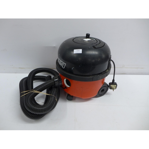 2366 - A numatic Henry style vacuum cleaner with pipe (No attachments)