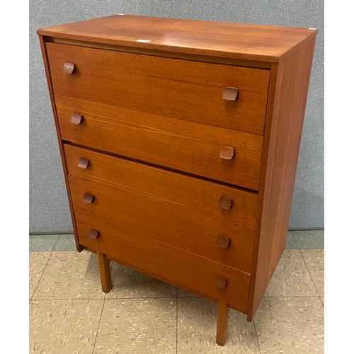 23A - A teak chest of drawers