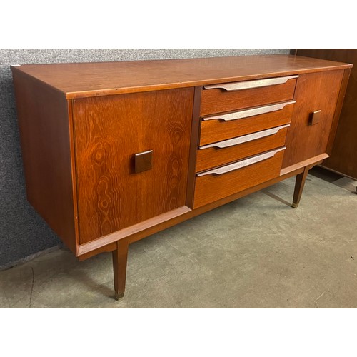 24A - A teak sideboard