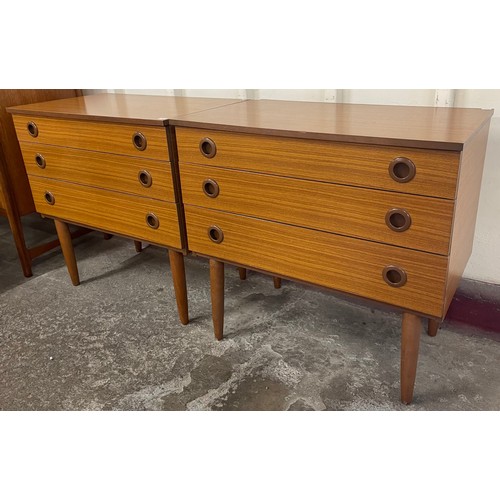 31A - A pair of teak chest of drawers