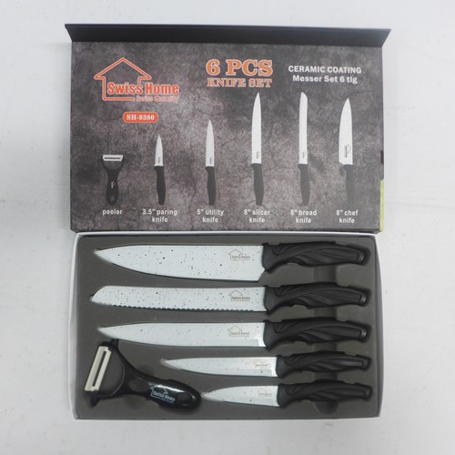 2098 - A Swiss Home 6 piece ceramic coated knife set