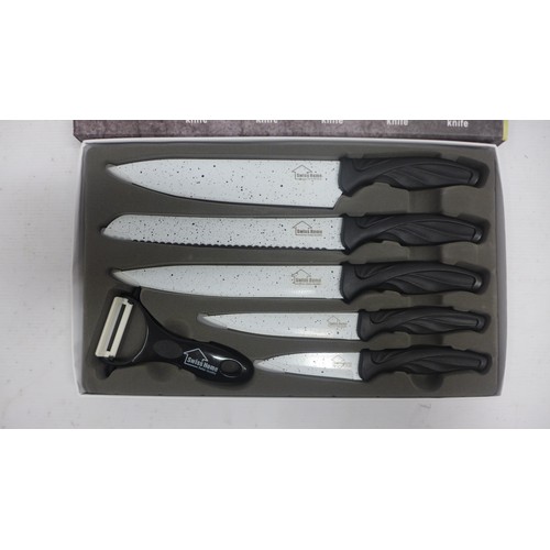 2098 - A Swiss Home 6 piece ceramic coated knife set