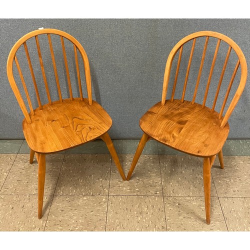 38A - A pair of Ercol Blonde elm and beech Windsor dining chairs