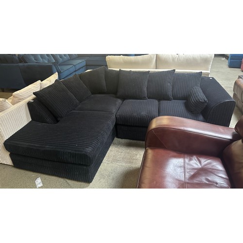 1519 - A black jumbo cord compact corner sofa - Brand new