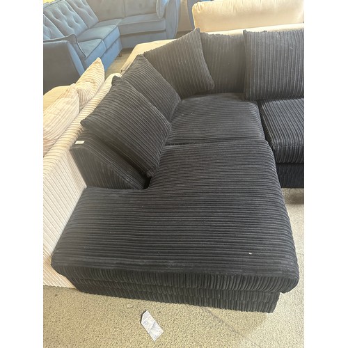 1519 - A black jumbo cord compact corner sofa - Brand new