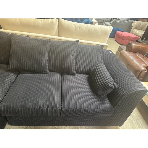 1519 - A black jumbo cord compact corner sofa - Brand new