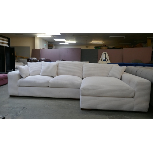 1497 - An ivory jumbo cord L shaped sofa - Brand new