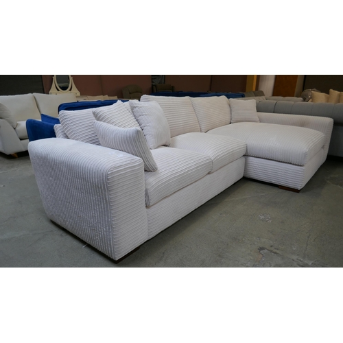 1497 - An ivory jumbo cord L shaped sofa - Brand new