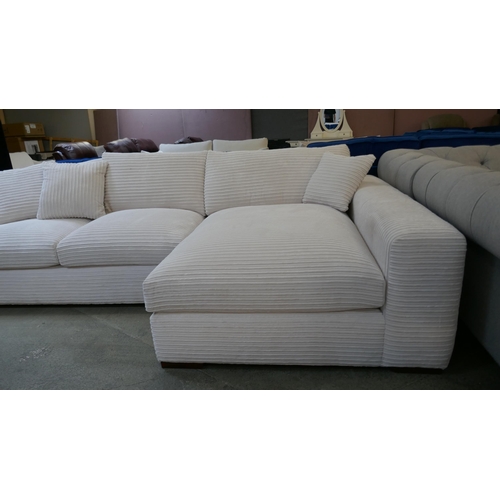 1497 - An ivory jumbo cord L shaped sofa - Brand new