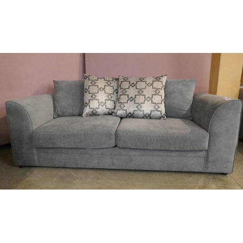 1511 - A pewter velvet three seater sofa - Brand new RRP £540